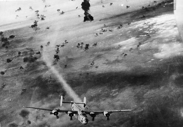 A B-24 Liberator of the 15th US Air Force, comes through an intense