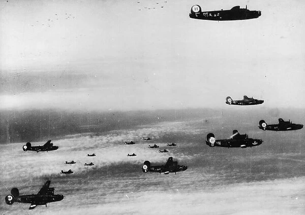 B-24 Liberator bombers of the 15th US Air Force, shown in formation near their target