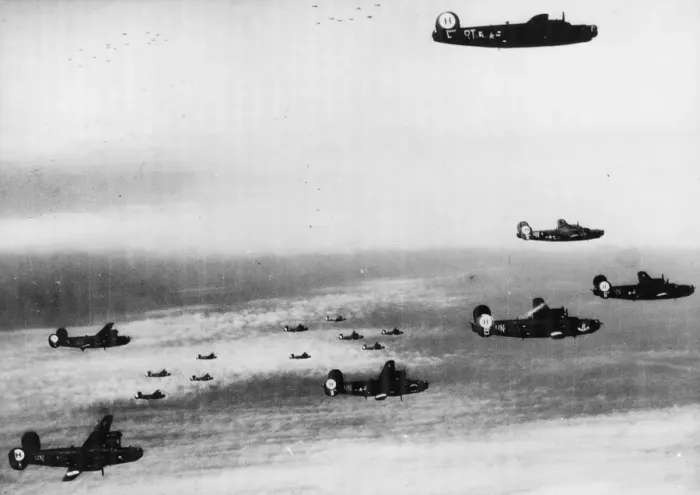 Framed Print : B-24 Liberators of the 15th US Air Force, shown in formation near their target Framed Print : B-24 Liberators of the 15th US Air Force, shown in formation near their target