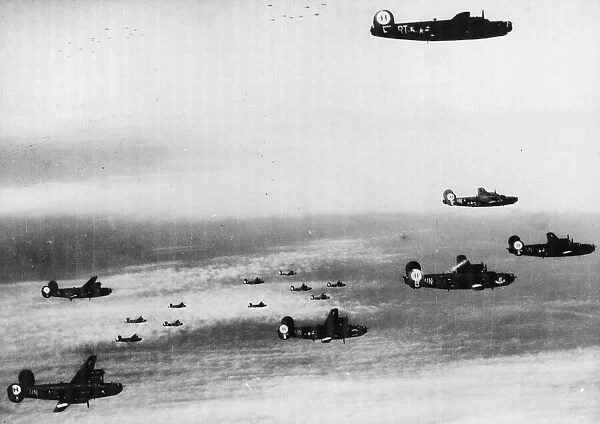 B-24 Liberators of the 15th US Air Force, shown in formation near their target