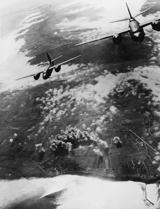Framed Print : B-26 Marauders of the ninth US Air Force cross the French coast in the early morning