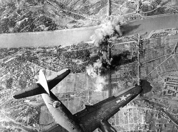 B26 Marauder bomber attacks Neuenberg rail span across the Rhine as the US Seventh Army