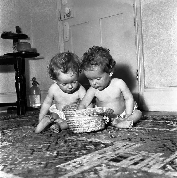 Babies Chirstopher and John Hutton seen have playing. April 1953 D1765-001