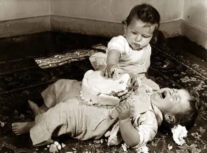 Framed Print : Two babies enjoying their birthday cake. Circa 1950 NO USE FOR GREETINGS