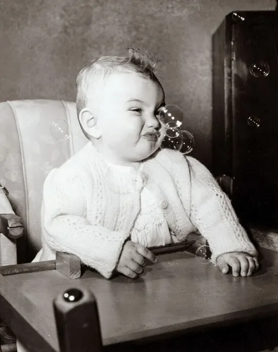Framed Print : Baby enjoying bubbles in the air, circa 1950 Framed Print : Baby enjoying bubbles in the air, circa 1950