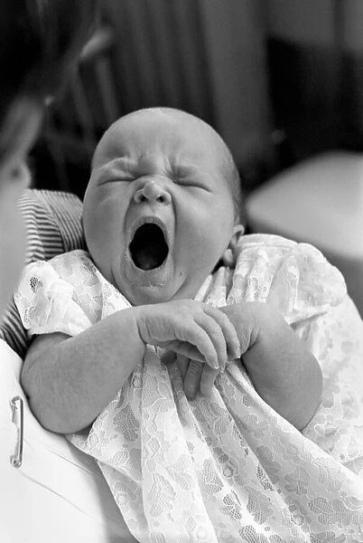 Baby girl yawns in the childrens hospital in Myrtle street, Liverpool