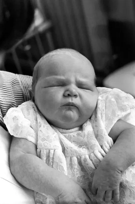 Framed Print : Baby girl yawns in the childrens hospital in Myrtle street, Liverpool Framed Print : Baby girl yawns in the childrens hospital in Myrtle street, Liverpool