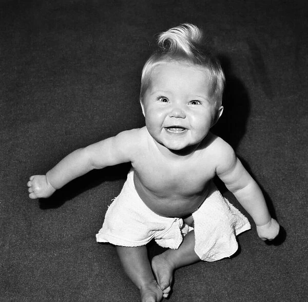 Baby Julie Miles seen here exploring her home. November 1953 D6665-002