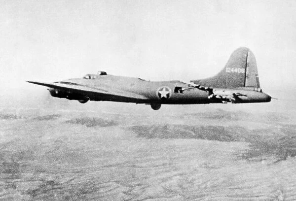 A badly damaged Boeing B-17F-5-BO Flying Fortress, 41-24406, All American III