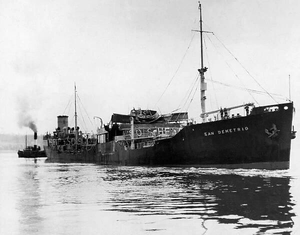The badly fire damaged San Demetrio after being re-boarded by a skeleton crew who then