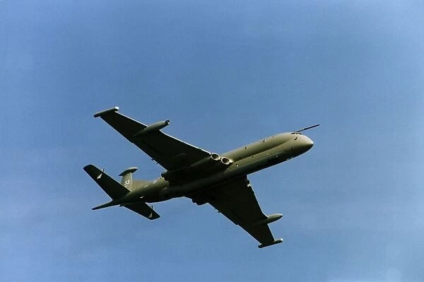 A BAE Nimrod in flight at teh Wroughton Air Show. 30th August 1993