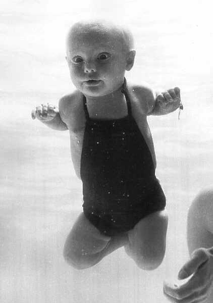 Bahama Lynch the underwater baby, 5months old. Bahama crawls around with her eyes wide