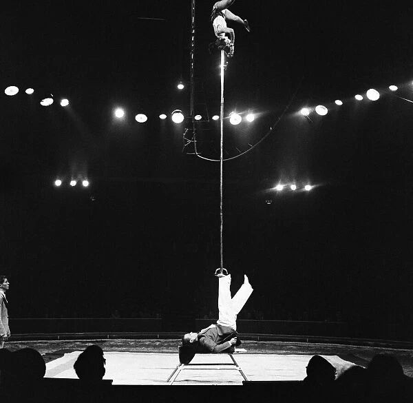 A balaning act at Bertram Mills Circus. 19th December 1958