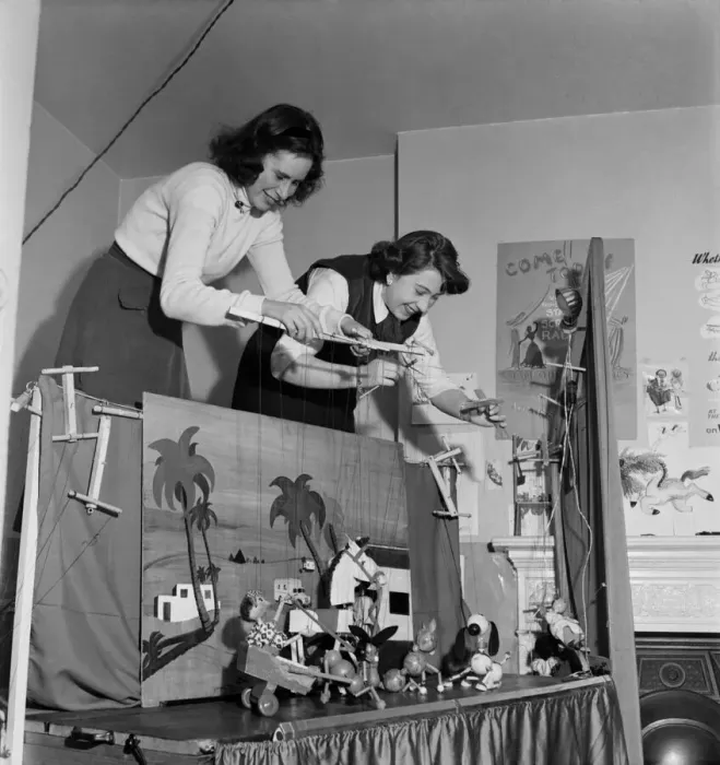 Framed Print : Baley and mother puppet show. March 1953 D106-001 Framed Print : Baley and mother puppet show. March 1953 D106-001