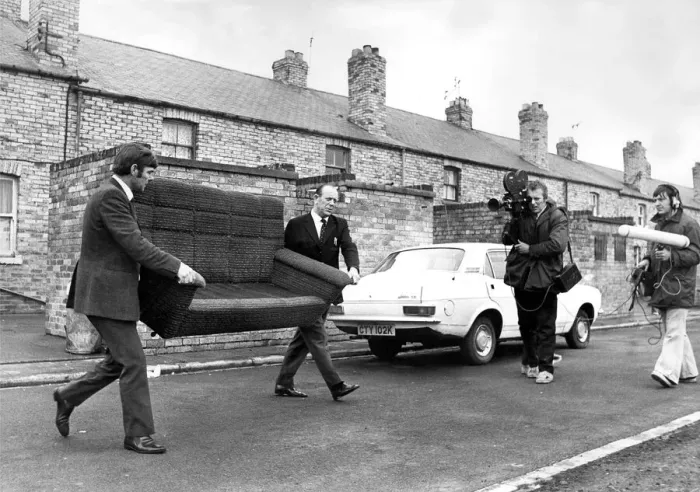 Framed Print : Baliffs removing furniture from a home in East Chevington in 1973