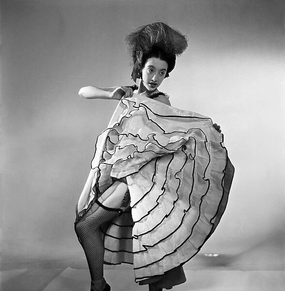 Ballet dancer performing the can can December 1953 D7303-003