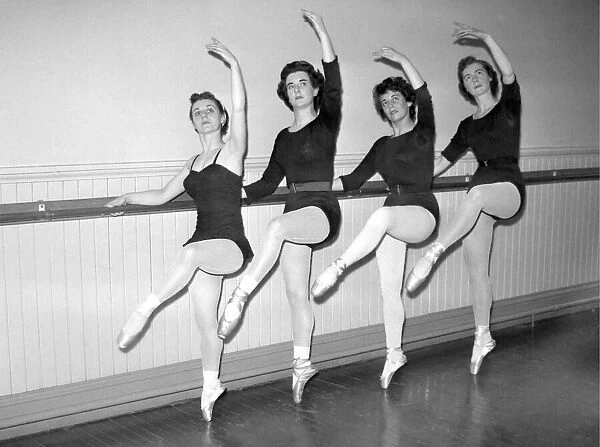Ballet stedents practise at the 'barre'Ballet calsses are held at the B. A. I