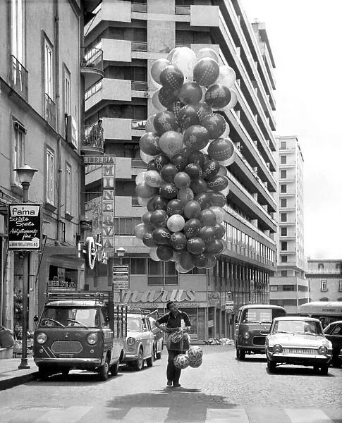 A balloon seller on the streets of Naples, Italy. Circa 1965 P004786