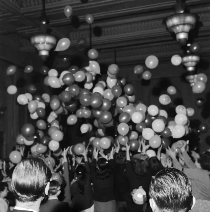 Framed Print : Balloons being released at a childrens party in Soho, London. December 1956 Framed Print : Balloons being released at a childrens party in Soho, London. December 1956