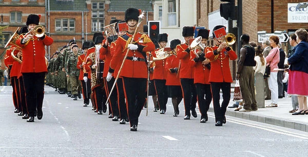 The band leads the way as the 34th Signal Regiment parades through the centre of