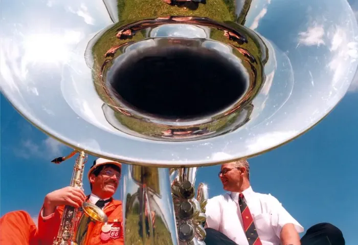 Framed Print : Bandsman Einar Torsvik from Norway chats with Keith Miller who plays for Pegswood Brass
