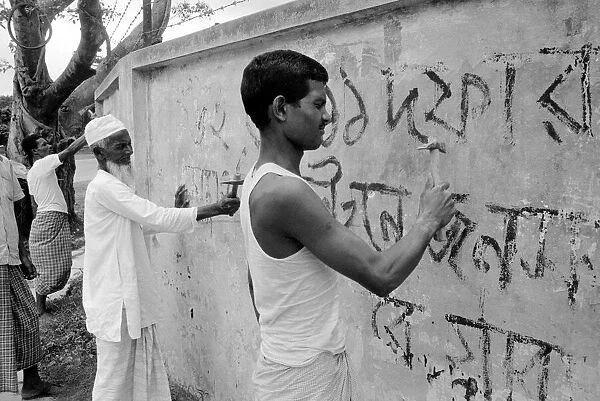 Bangladesh signs being chipped off walls, by order of the Military Government in Dacca