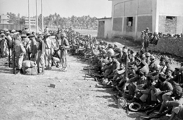 Bangladesh War of Independence 1971 Pakistani soldiers giving up their guns under