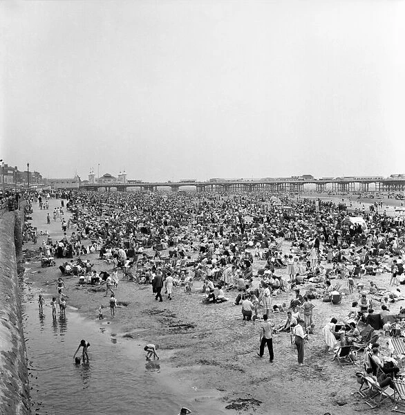 Bank holiday at Blackpool. Beach scenes  /  crowds  /  sunbathing. June 1960 M4319-013