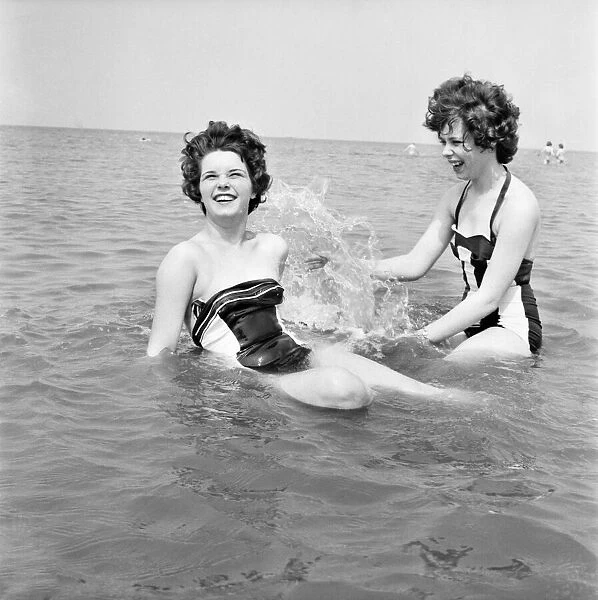 Bank holiday at Blackpool. Beach scenes  /  crowds  /  sunbathing. June 1960 M4319-012