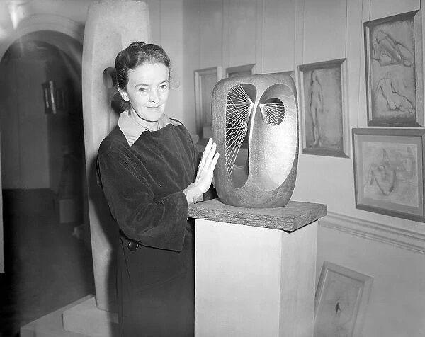 Barbara Hepworth Artist and Sculpturer - September 1952 with her work at
