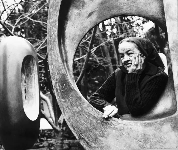 Framed Print : Barbara Hepworth sculptress in her garden January 1970 standing next to one of her