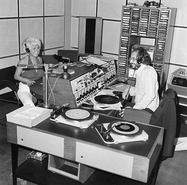 Barbara Windsor, Actress, 7th July 1976. Pictured, being interviewed by a local radio