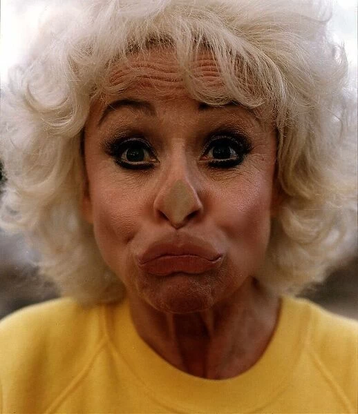 Barbara Windsor Actress With Her Face Pressed Against A Glass Pane
