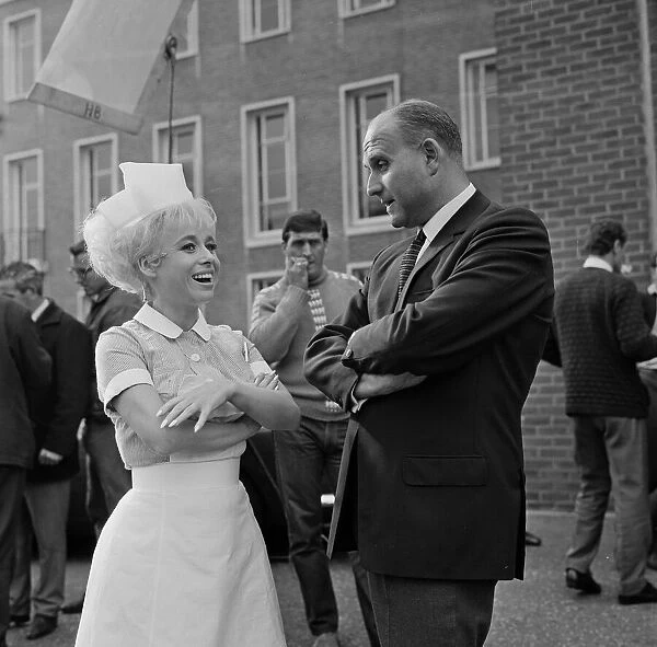 Barbara Windsor with Gerald Thomas (director) on the film set of Carry On Doctor