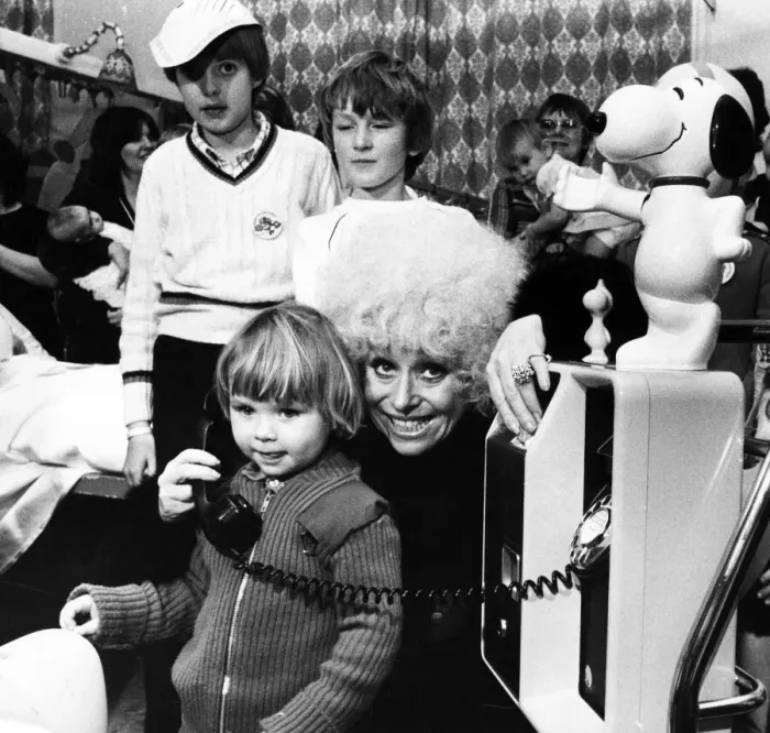 Framed Print : Barbara Windsor paid an early Christmas call to sick children yesterday-and bought a Framed Print : Barbara Windsor paid an early Christmas call to sick children yesterday-and bought a