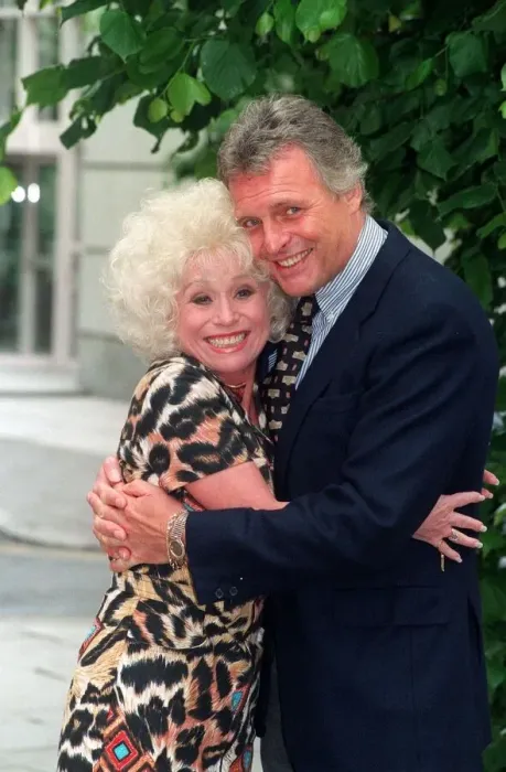 Framed Print : BARBARA WINDSOR AND PETER DEAN - ACTORS CUDDLE EACH OTHER AT THE LAUNCH OF THE PLAY