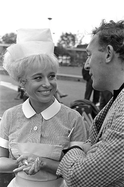 Barbara Windsor (with unknown male) on the film set of Carry On Doctor