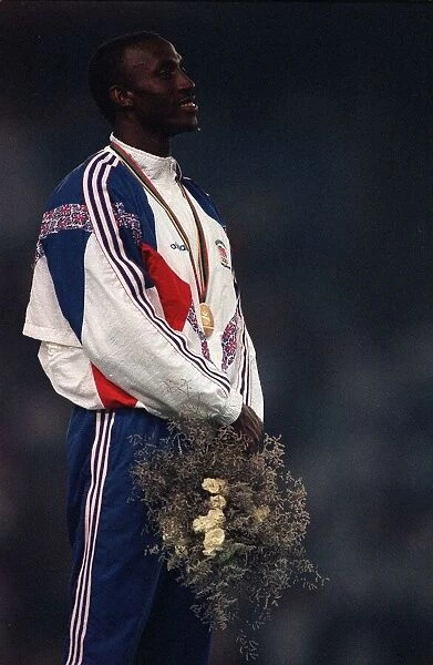 Barcelona Olympics June 1992 Linford Christie Athlete standing on podium