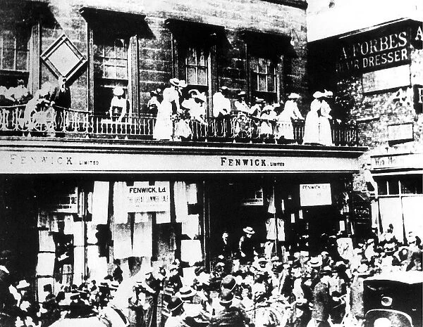 Bargain hunters cram Fenwick department store at the turn of the century