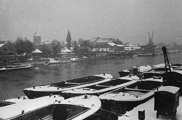 Barges tied up at Kingston as the River Thames freezes January 1940