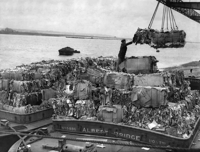 Framed Print : These barges of waste-paper have arrived at their destination giant gantry cranes lift Framed Print : These barges of waste-paper have arrived at their destination giant gantry cranes lift