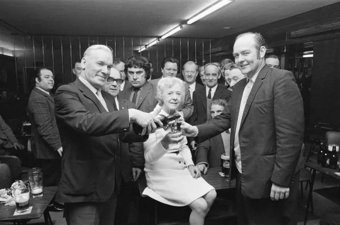 Framed Print : Barmaid retires in Billingham, enjoying a celebration drink with customers, 1973