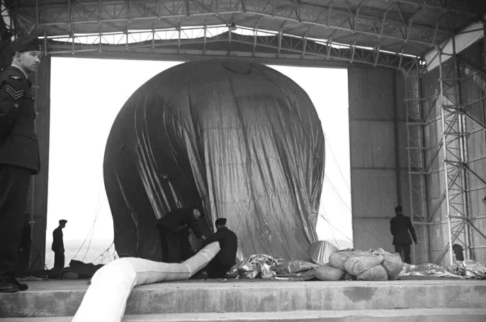 Framed Print : Barrage Balloon being filled in its hangar at Hook, Surrey. October 1938 Framed Print : Barrage Balloon being filled in its hangar at Hook, Surrey. October 1938