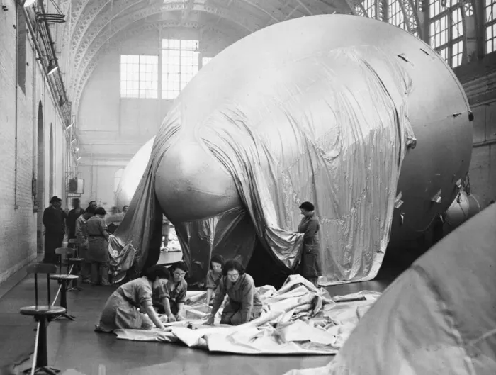 Framed Print : A barrage balloon is a large unmanned tethered kite balloon used to defend ground targets Framed Print : A barrage balloon is a large unmanned tethered kite balloon used to defend ground targets