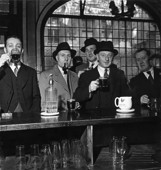 Framed Print : Barristers, clerks and newsmen from a neighbouring office gather together at the Feathers Framed Print : Barristers, clerks and newsmen from a neighbouring office gather together at the Feathers