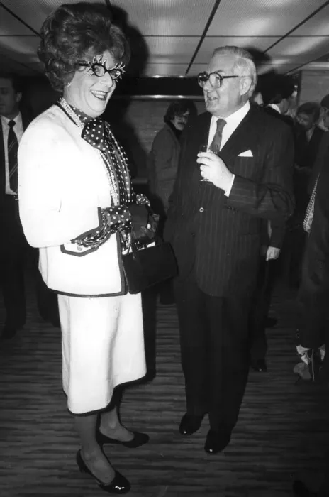 Framed Print : Barry Humphries as Dame Edna Everedge talking to Jim Callaghan at Standard theatre awards