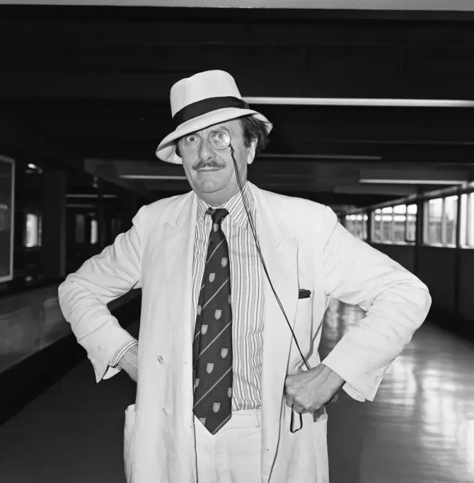 Framed Print : Barry Humphries leaving Heathrow Airport for New York. 10th August 1983 Framed Print : Barry Humphries leaving Heathrow Airport for New York. 10th August 1983