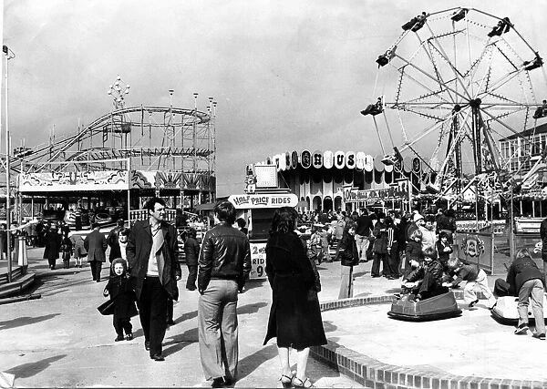 Barry Island - Funfair - People pictured enjoying the rides at the funfair during