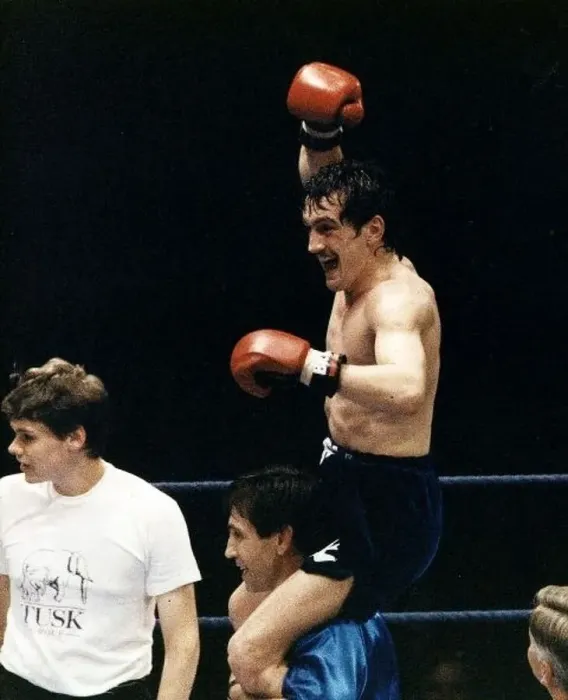  : Barry McGuigan Boxing is lifted on to the shoulders of his trainer Jimmy Tibbs after
