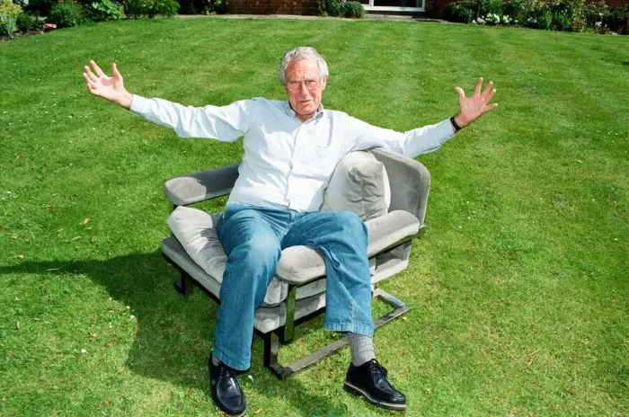 Framed Print : Barry Norman Film Critic seen here in the garden of his Datchworth home with the chair he Framed Print : Barry Norman Film Critic seen here in the garden of his Datchworth home with the chair he